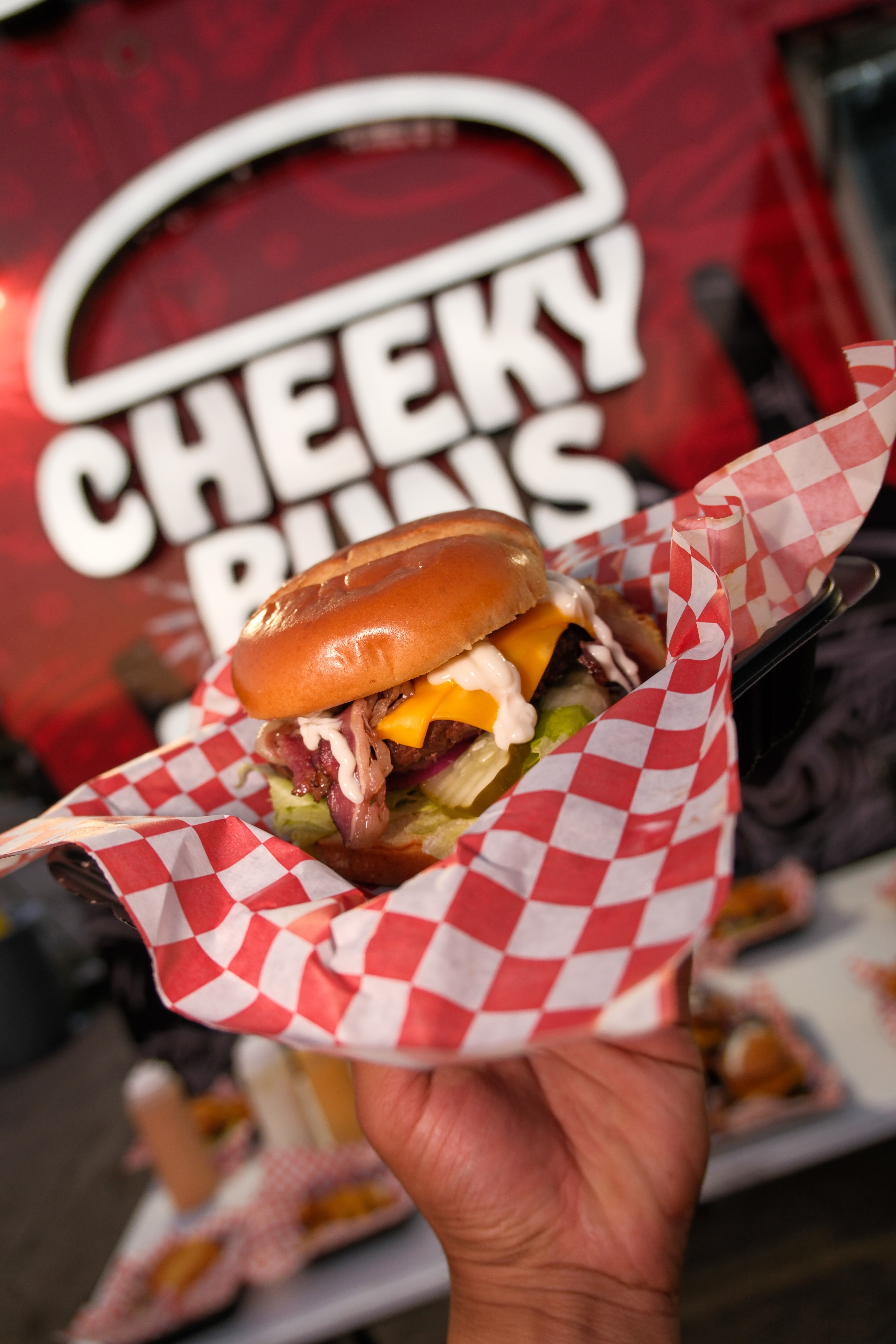 Satisfied customer with Cheeky Buns meal
